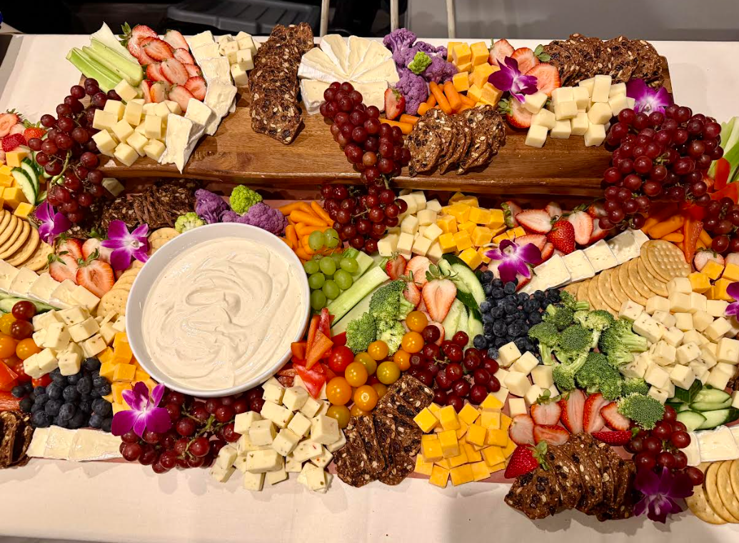 Bailey Family Catering grazing table with fruit, cheese, and crackers